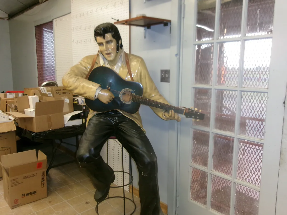 Life Sized Elvis Presley on Metal Stool with Guitar